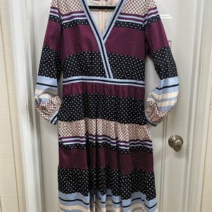 Mid length dress with pockets.  Size 12, cotton spandex blend, machine washable.